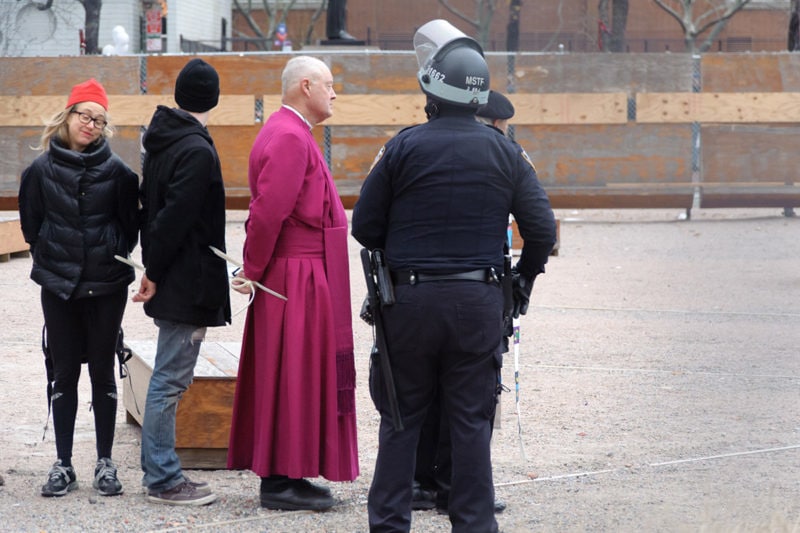 Bishop George Packard being arrested at Duarte Park